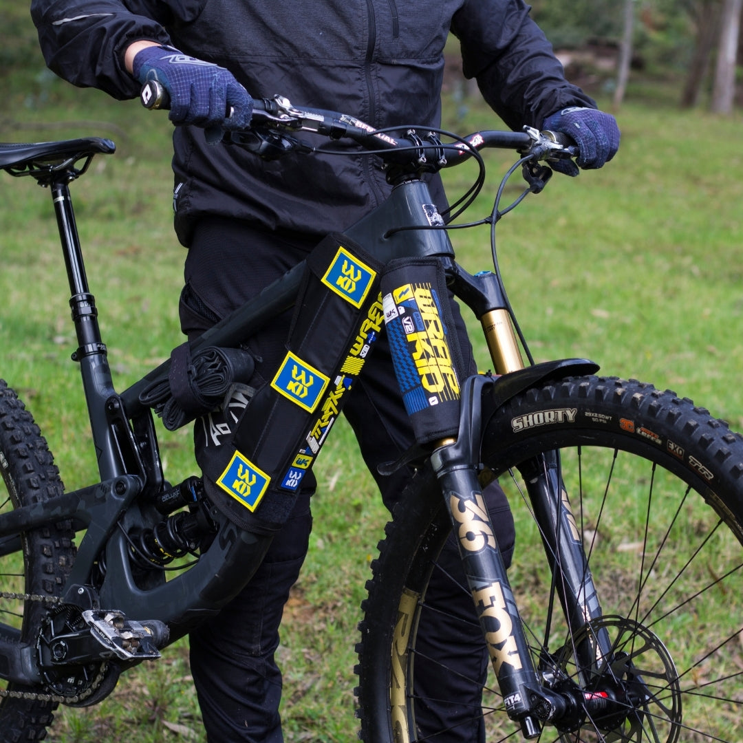 Protector de Transporte WrapKid BASE, Azul/Amarillo